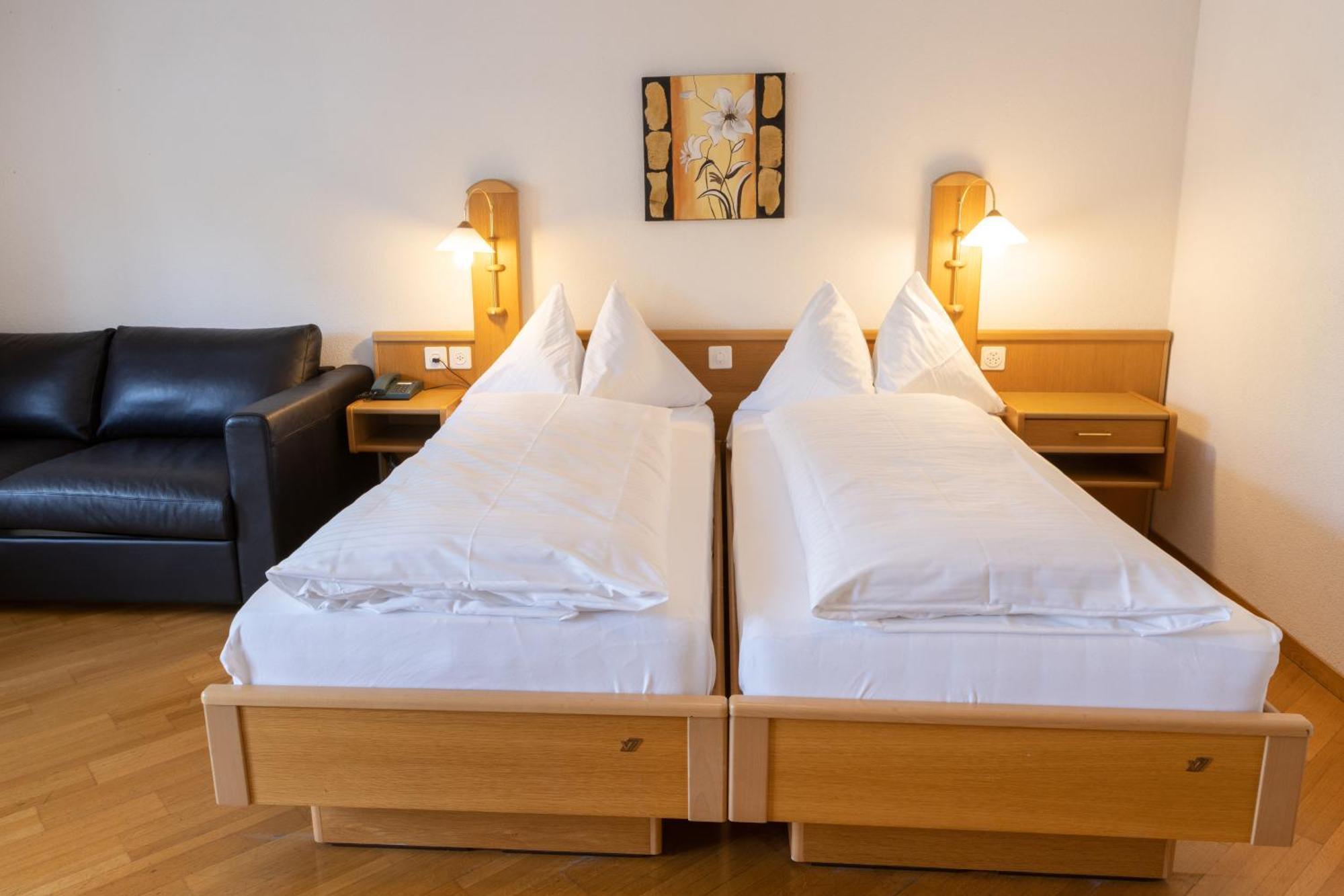 Strandhotel Seeblick Faulensee Esterno foto