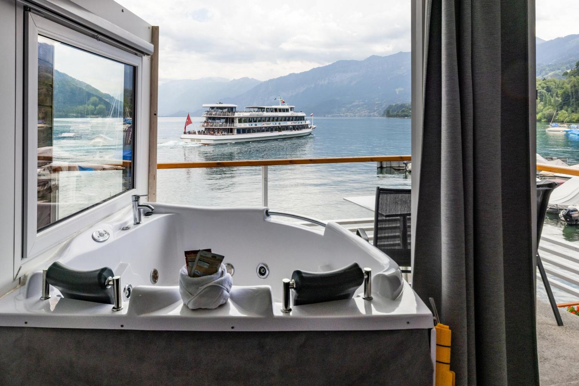 Strandhotel Seeblick Faulensee Esterno foto