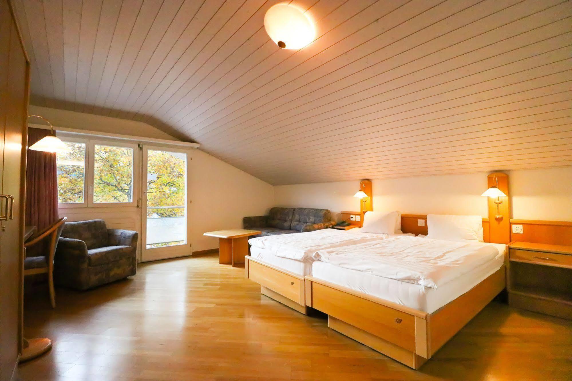 Strandhotel Seeblick Faulensee Esterno foto