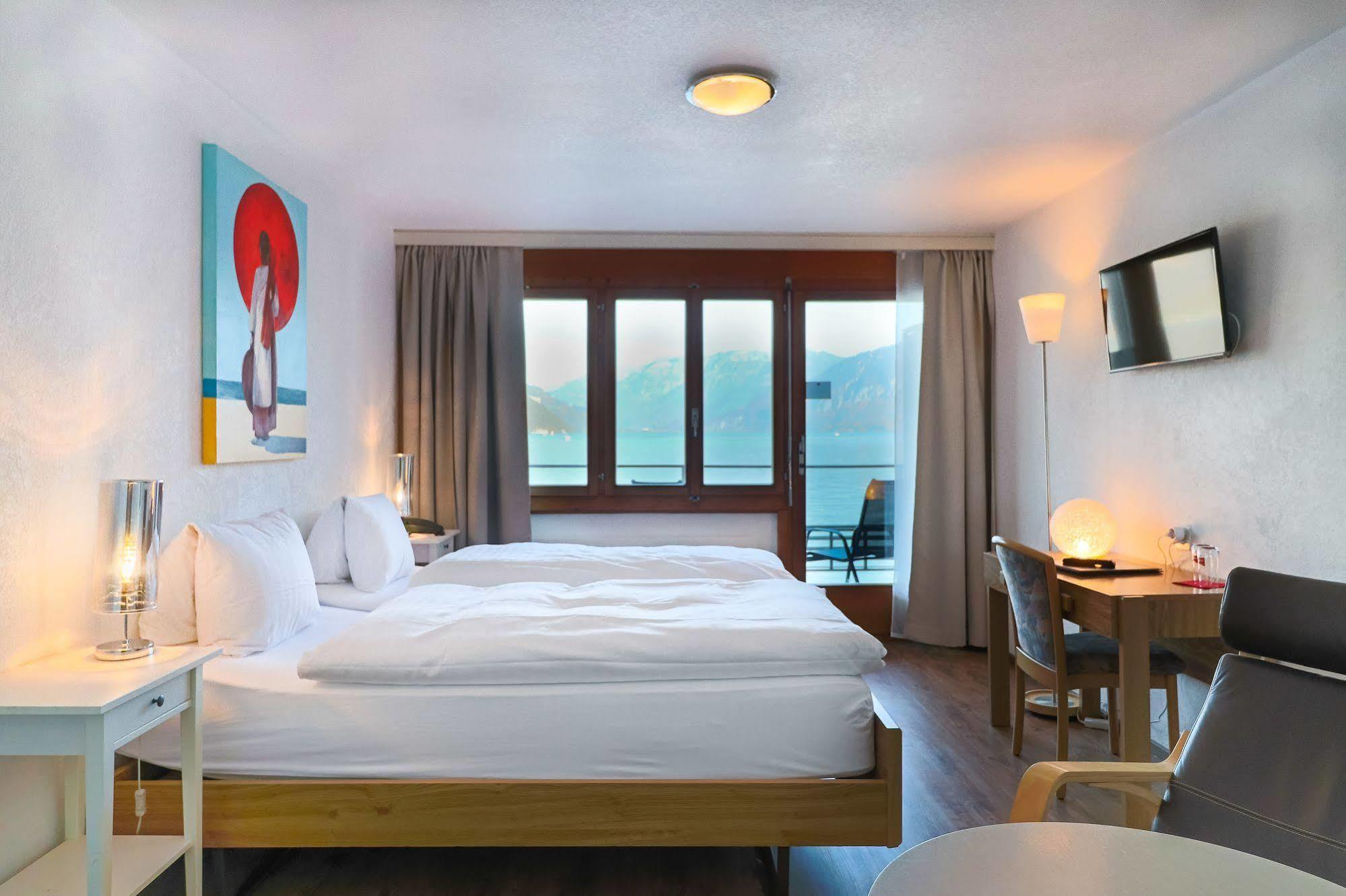 Strandhotel Seeblick Faulensee Esterno foto
